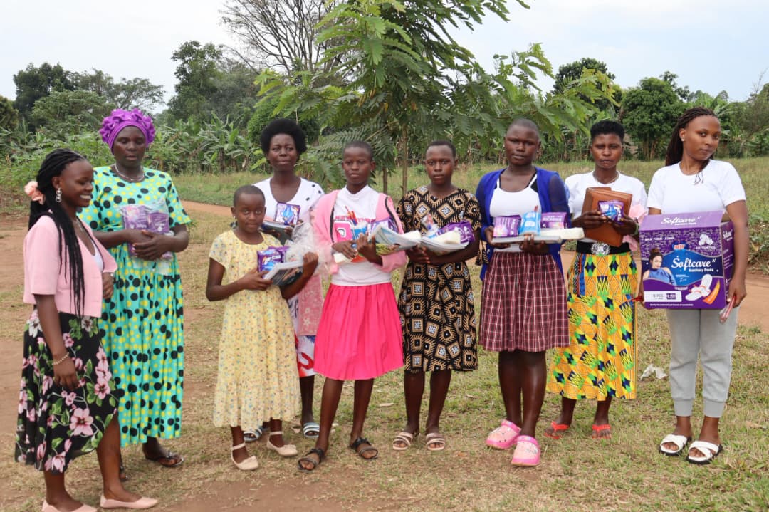 Girls and women receiving menstrual health and dignity support